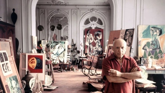 Picasso in his studio | Image source: https://blog.barcelonaguidebureau.com