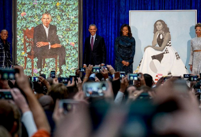 The newly unveiled portraits of former President and First Lady Barack and Michelle Obama and artists Kehinde Wiley and Amy Sherald, at a ceremony at the Smithsonian's National Portrait Gallery. | Image credit: Associated Press, Image source: latimes.com