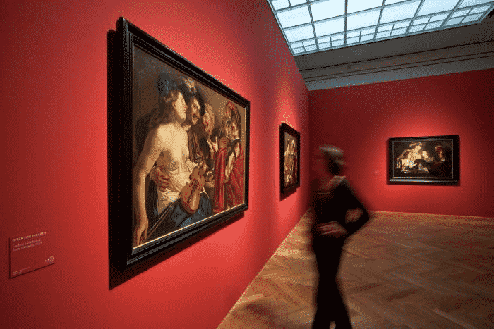 A visitor viewing exhibition “Caravaggio in Holland” at Städel Museum in Frankfurt am Main in Germany  Image source staedelmuseum.de